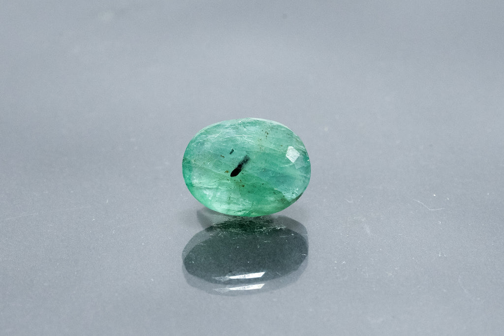 emerald 5.43 carat back image