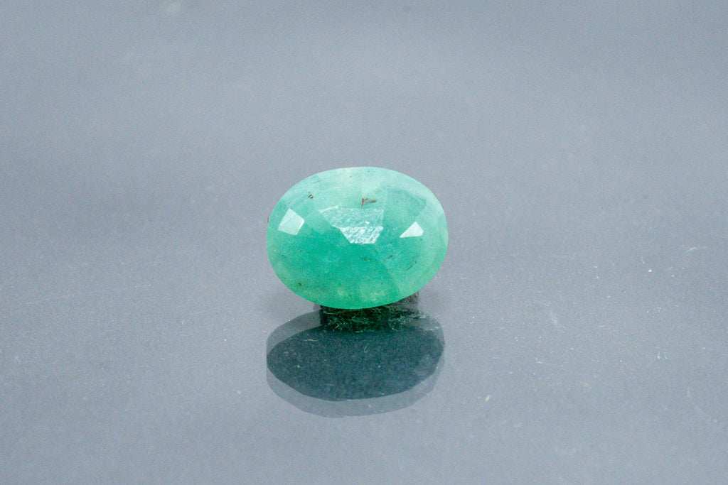 emerald 5.66 carat back image
