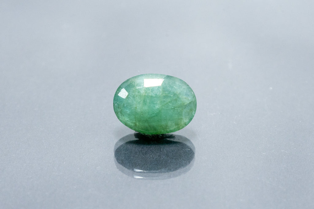 emerald 7.74 carat back image